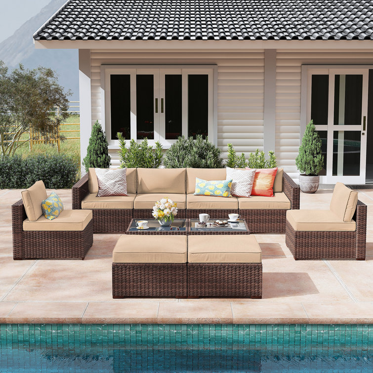 10 Piece Rattan Sectional Seating Group with Cushions